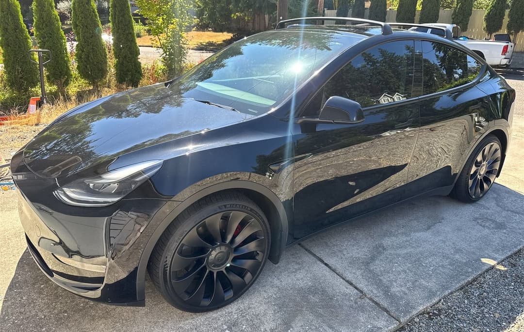Tesla electric vehicle prepared for auto transport